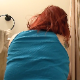 An American girl with tattoos and red dyed hair is recorded from the rear as she takes a shit into a toilet and wipes her ass. Poop action is clearly seen, and product is shown in the toilet bowl. Presented in 720P HD. About 2.5 minutes.